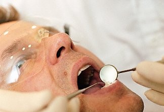 Осмотр стоматолога